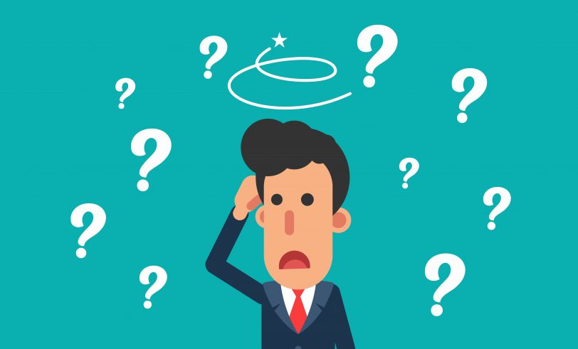 cartoon man scratching his head with question marks all around him